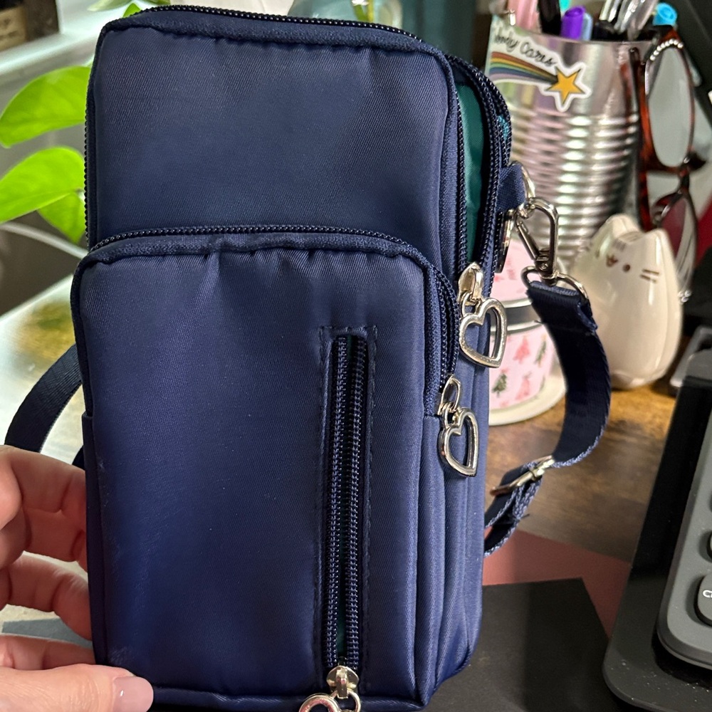 Elegant Navy Crossbody Bag with Heart Accents